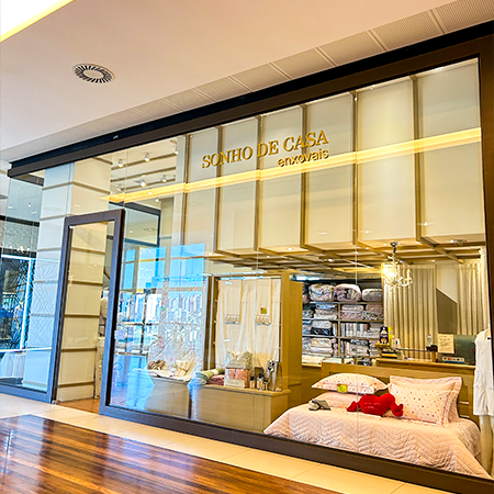 Logo da loja sonho de casa enxovais